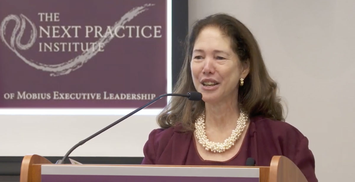 Amy Elizabeth Fox delivering keynote at NPI Institute 2023